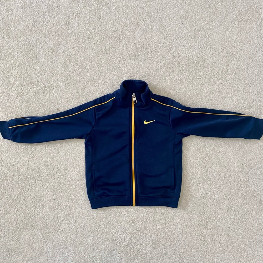 Gently used Nike navy blue and yellow striped zippered track jacket size 24m